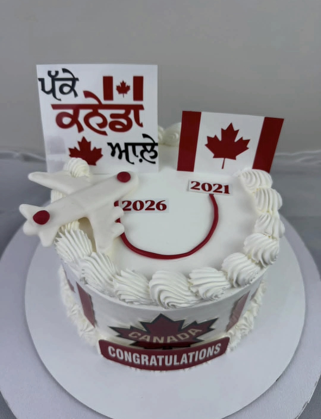 Welcome to Canada celebration cake